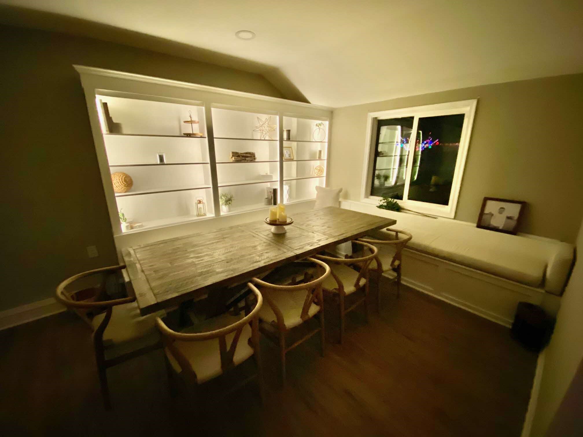 dinning room built in cabinet with storage bench